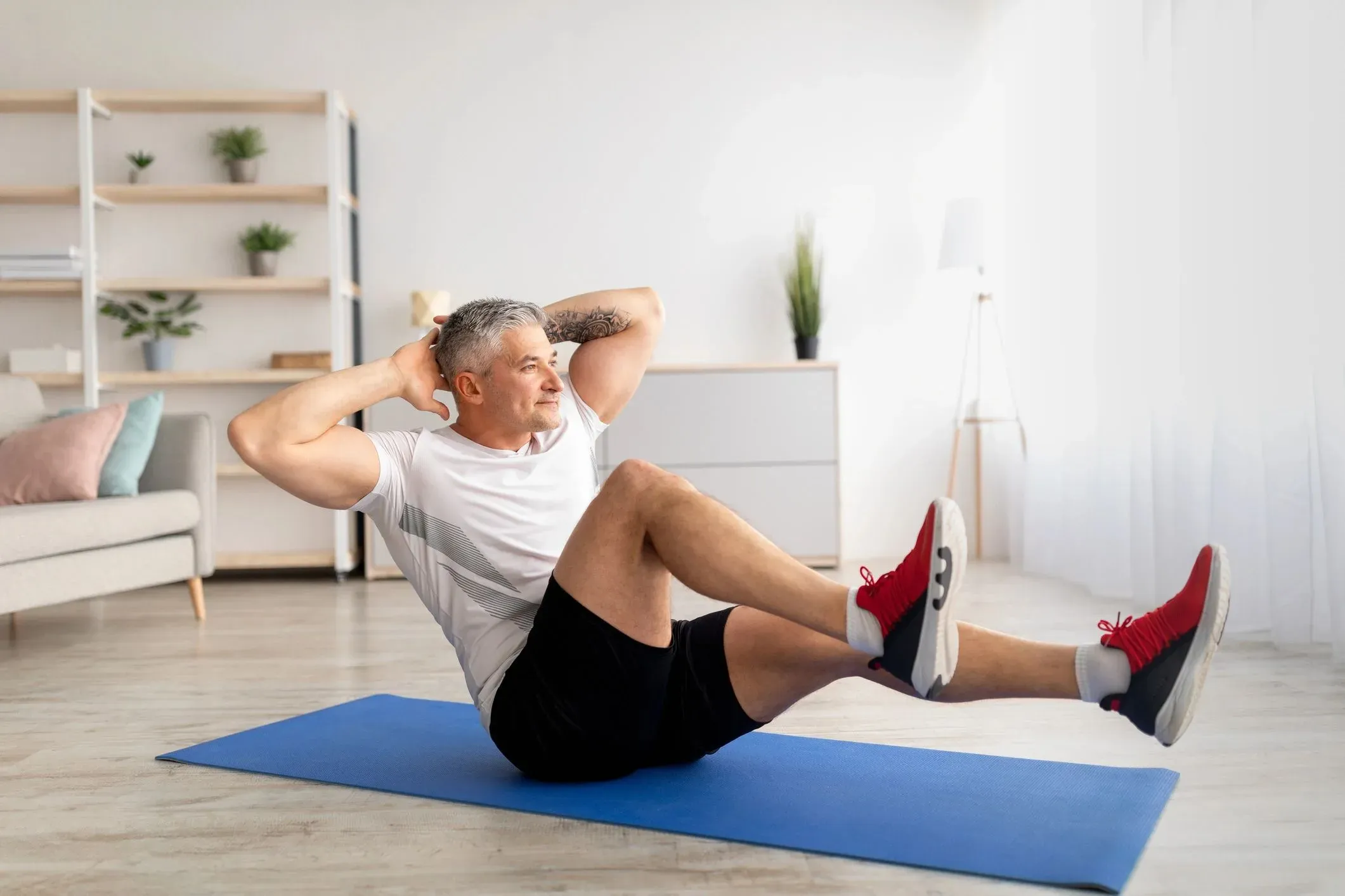 Person doing core and stability training on a mat