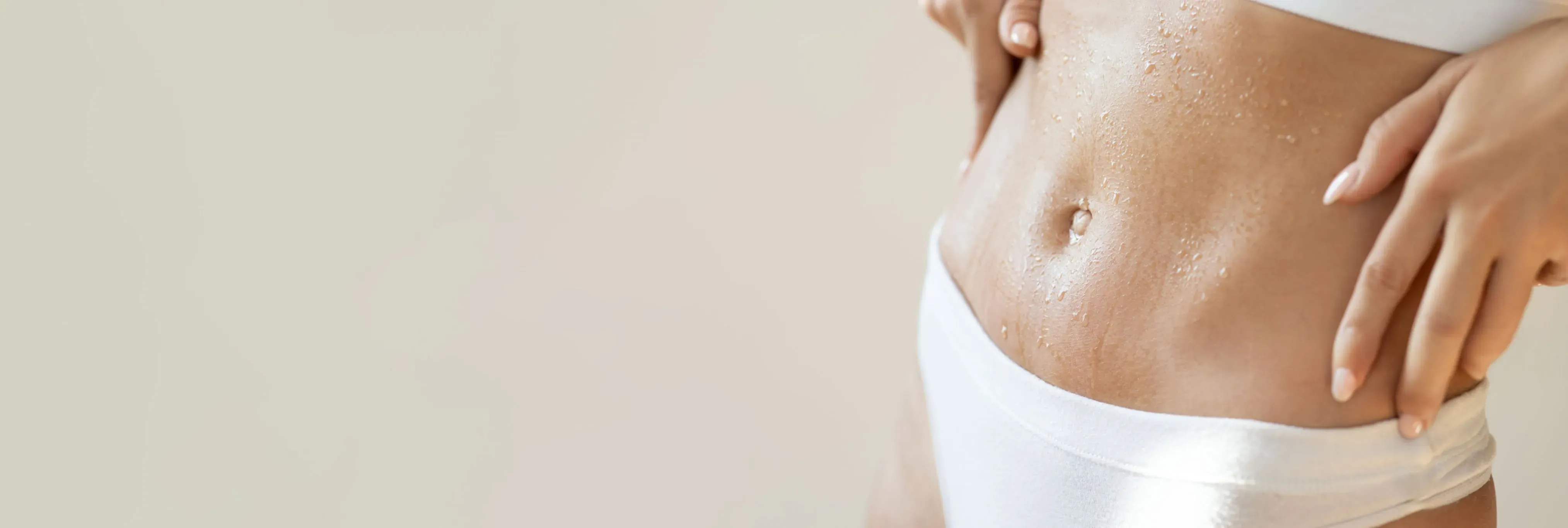 Cropped slim female torso illustrating healthy body composition