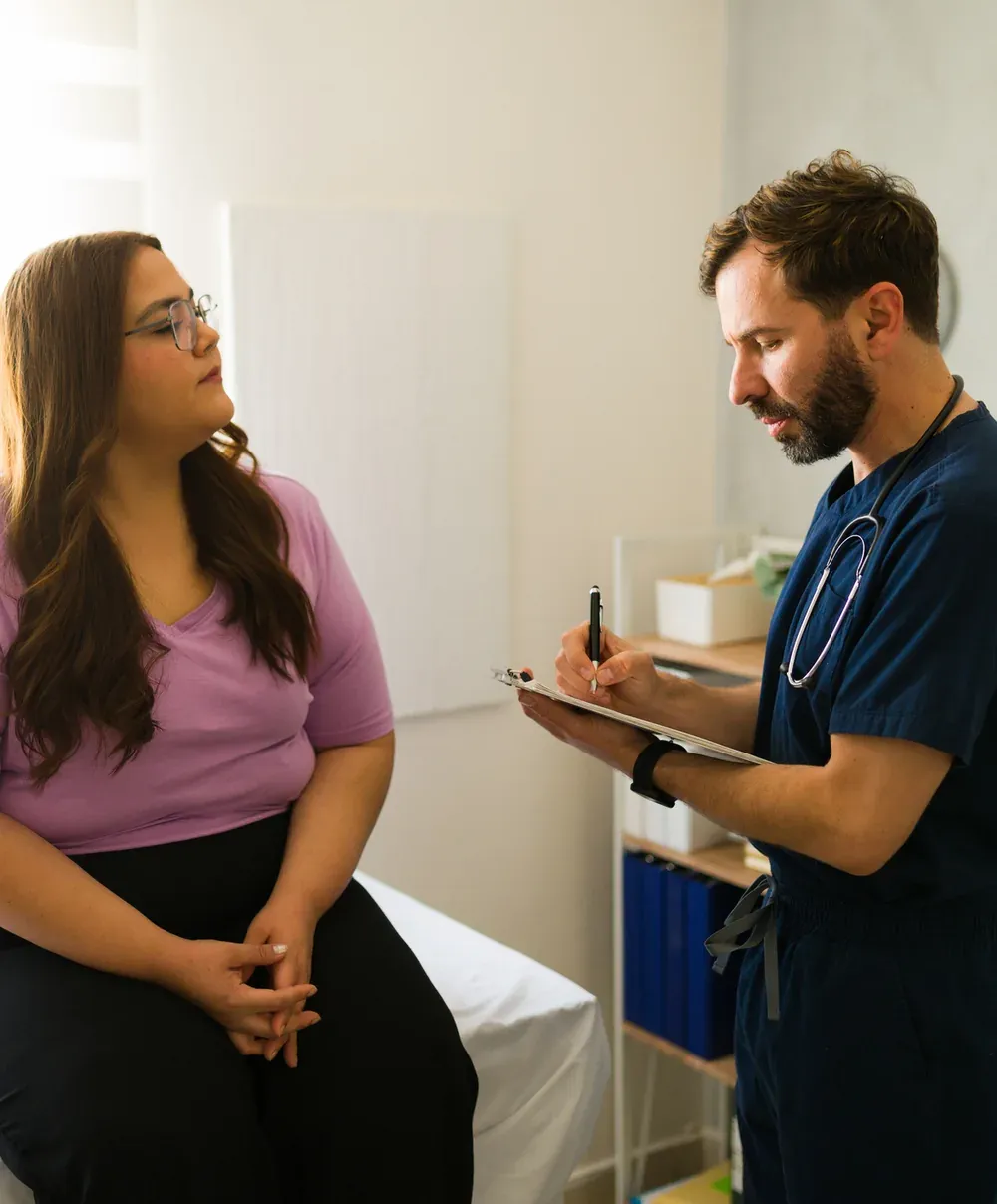 Patient consulting with a medical provider about a weight loss program